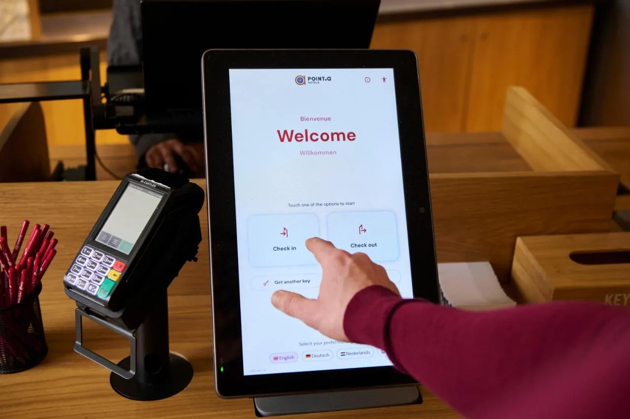 Guest using digital check-in tablet at Point A London Liverpool Street