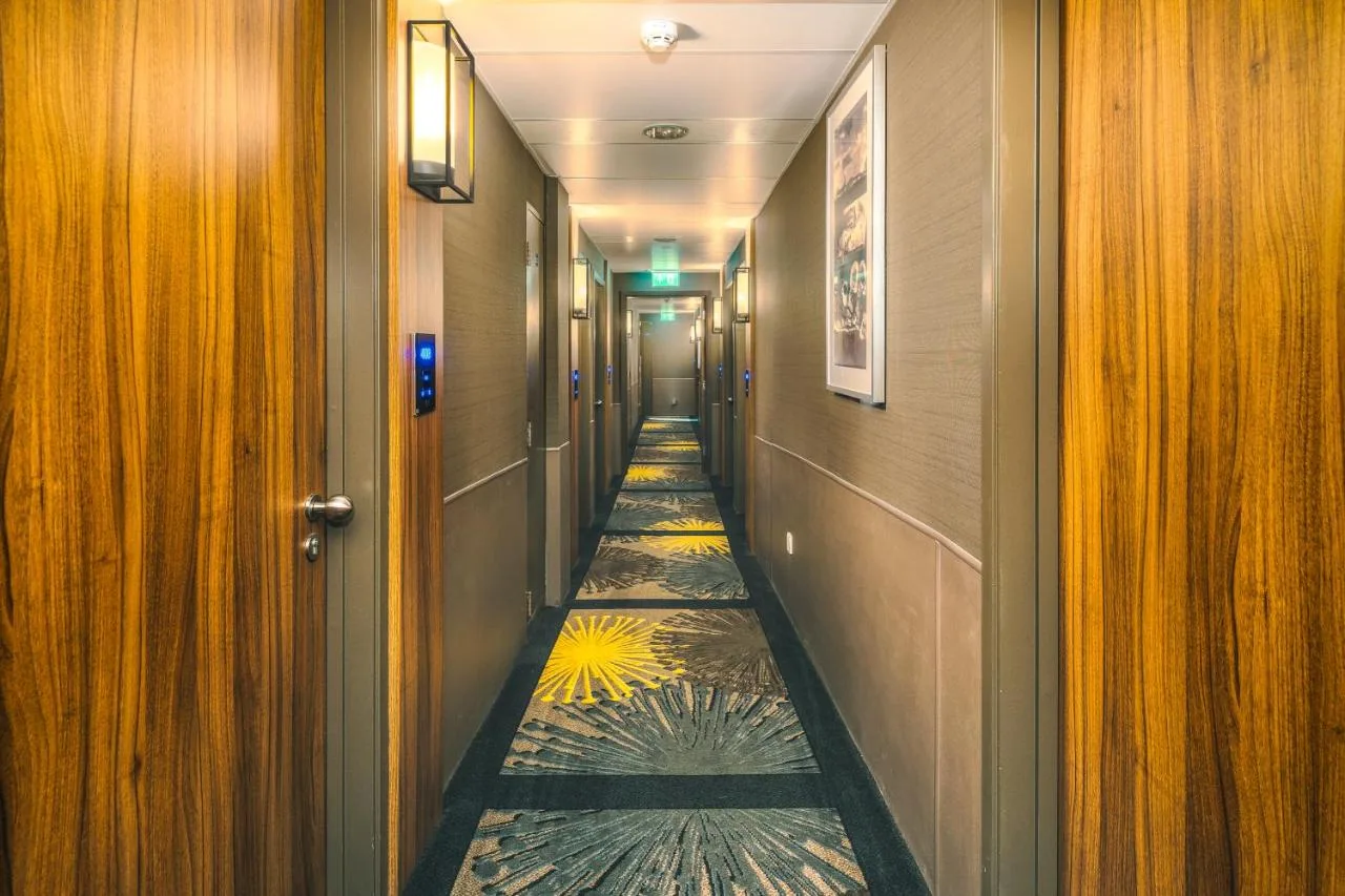 Tiled hallway with flower at Point A London Liverpool Street